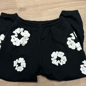 Denim Tears black and white sweatpants. Fake.